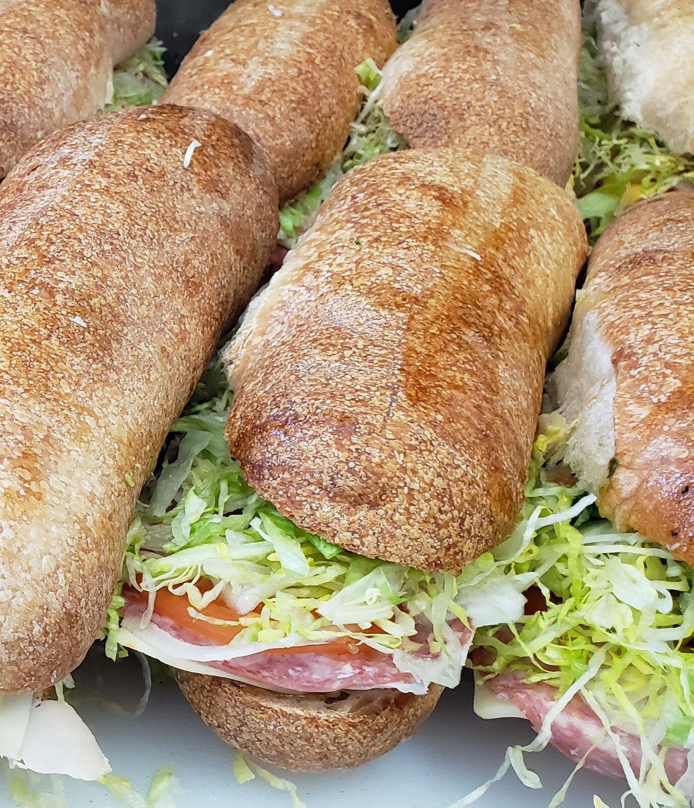 Brianno's signature Italian sub on crusty bread with premium cold cuts and house vinaigrette, Eagan MN Italian deli